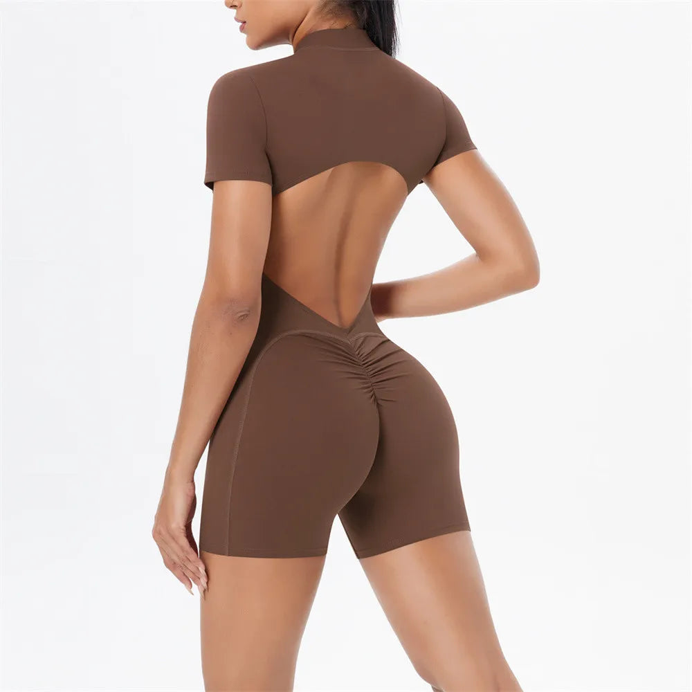 Xooie Fit one-piece workout jumpsuit with zipper featuring a stylish back cutout design in brown