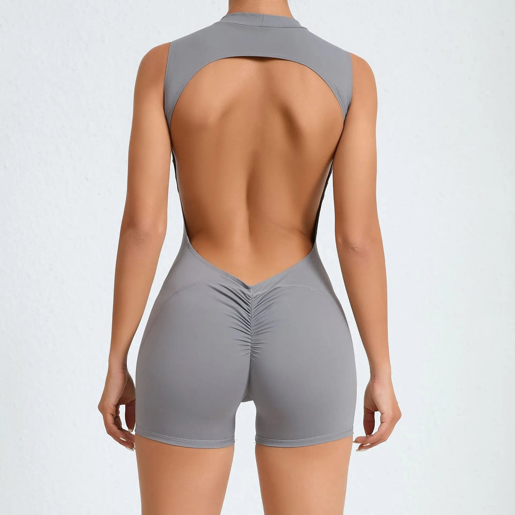 Xooie Fit open-back romper for workouts in gray with a stylish back design and comfortable fit