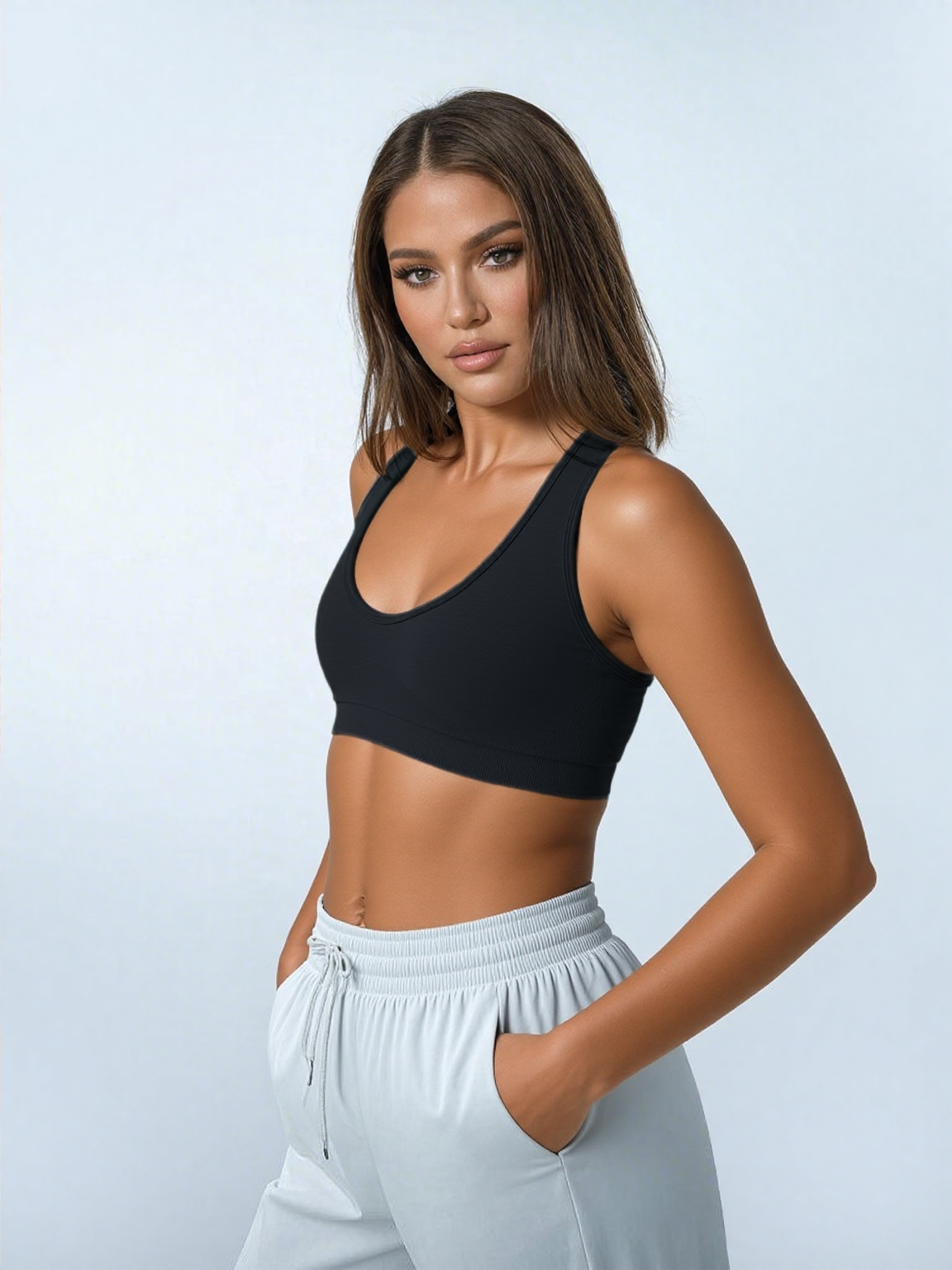 Xooie Fit open-back workout bra in black, designed for comfort and flexibility during exercise