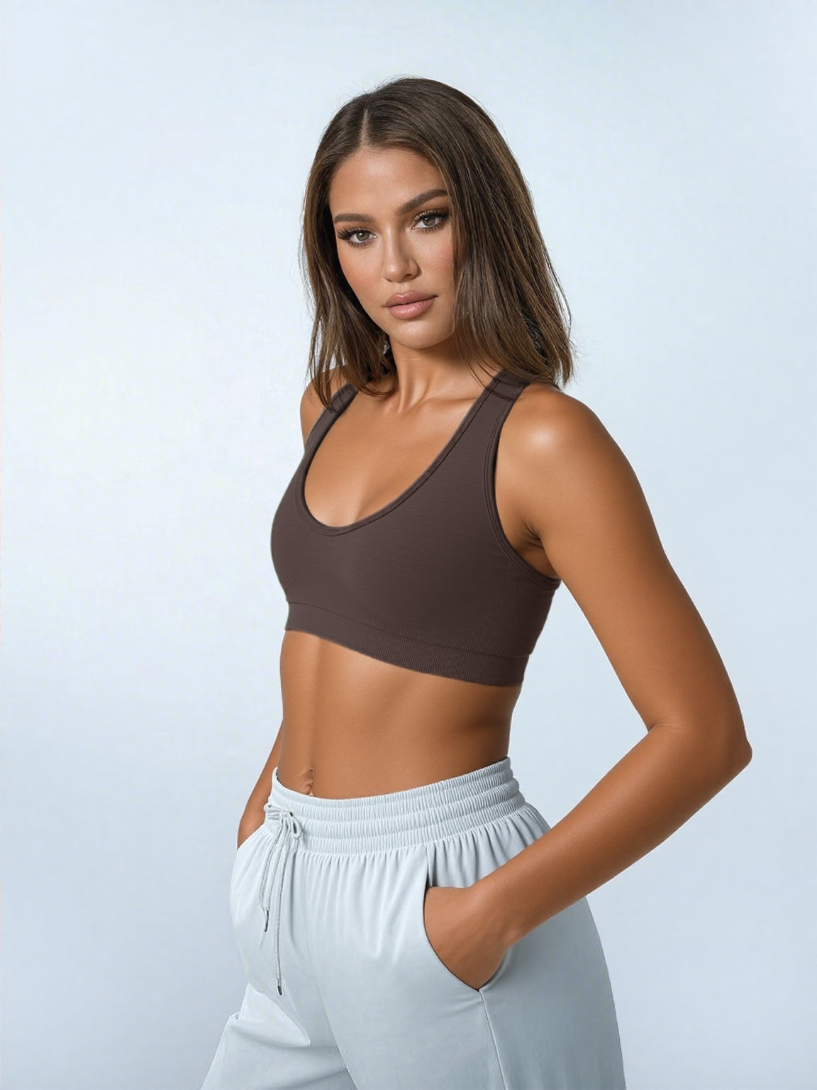 Xooie Fit open-back workout bra in brown, designed for comfort and support during workouts