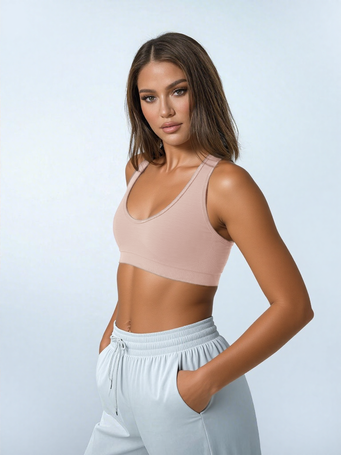 Xooie Fit open-back workout bra in soft pink for comfortable and stylish exercise support