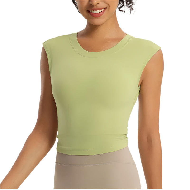 Xooie Fit open-back workout shirt in light green, perfect for comfortable exercise and stylish fitness wear