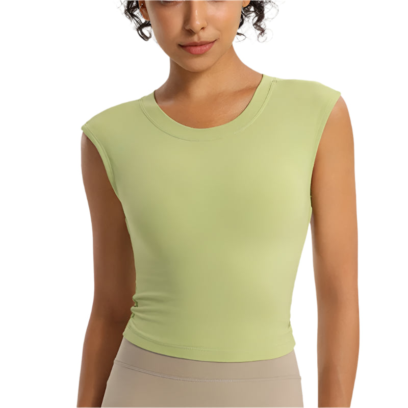 Light green open-back workout shirt by Xooie Fit for stylish and comfortable exercise