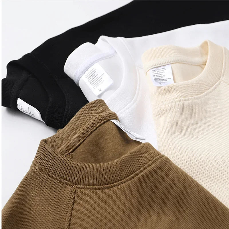 Oversized fleece sweatshirt for women in black, white, and tan colors showcasing soft fabric and relaxed fit