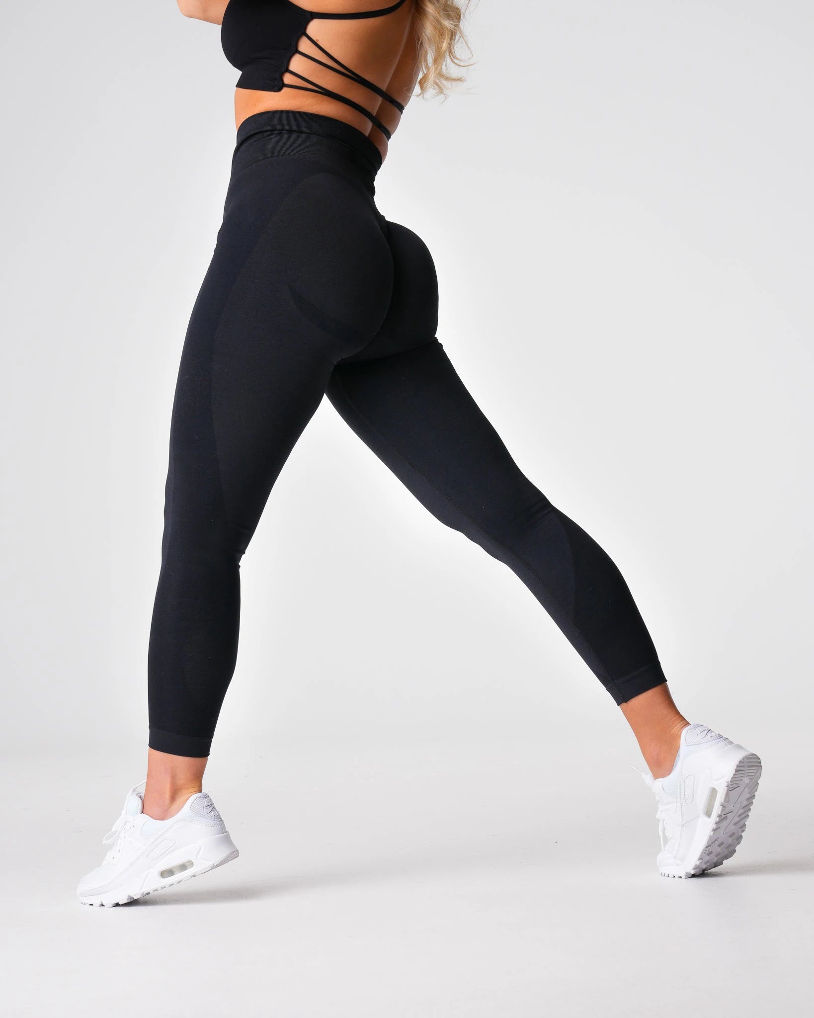 Xooie Fit high intensity leggings for women in black with a flattering high-waisted design