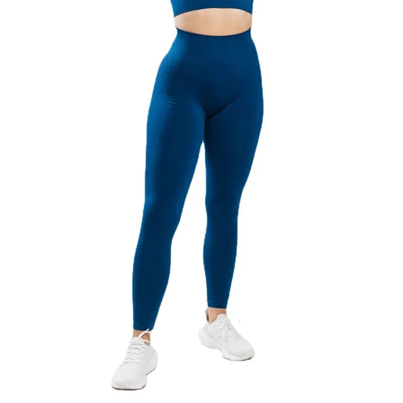 Xooie Fit high-waisted fitness leggings in teal, perfect for workouts and comfortable to wear