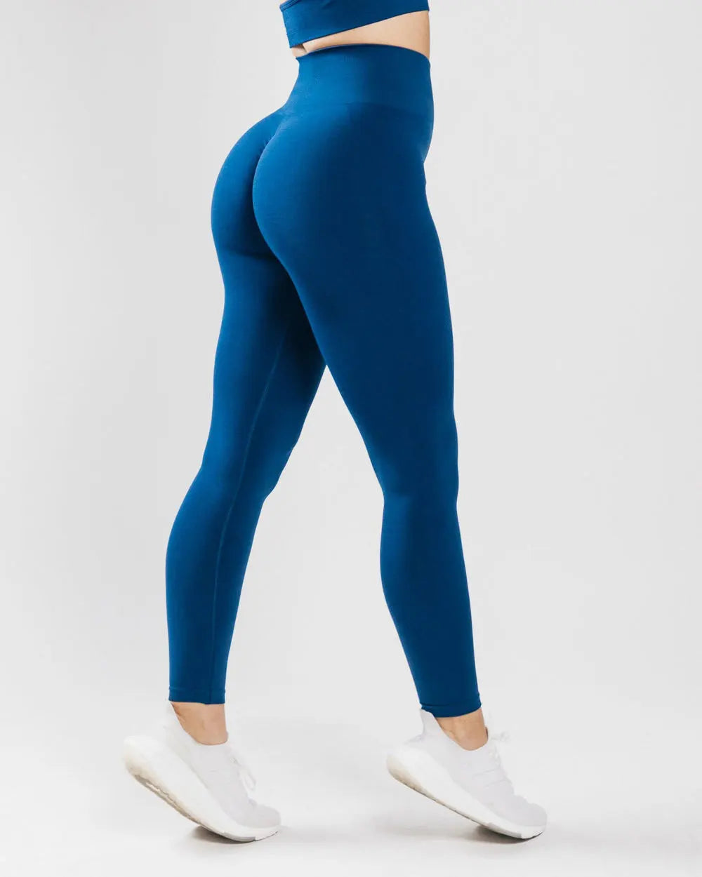 Xooie Fit high-waisted fitness leggings in blue, perfect for workout sessions and active lifestyles