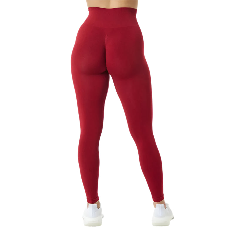 High-waisted fitness leggings in vibrant red color with a comfortable fit for workouts