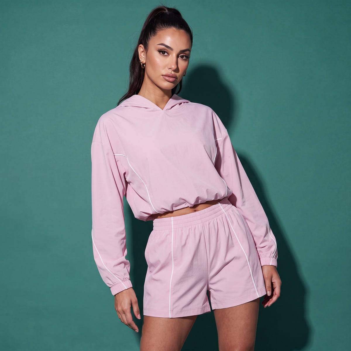Light pink hooded sweatshirt and drawstring shorts set with white piping