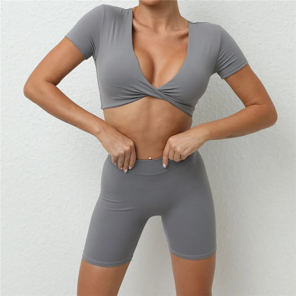 Xooie Fit short sleeve crop top and shorts set in gray with twist front design and high-waisted shorts