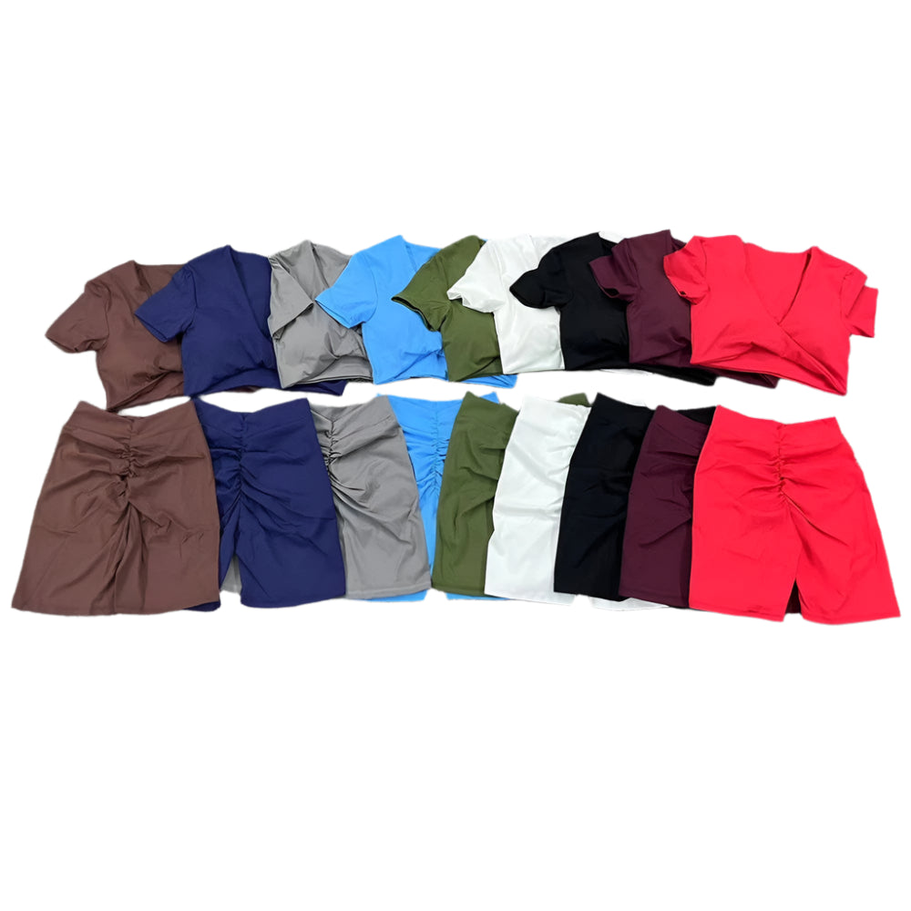 Xooie Fit short sleeve crop top and shorts set in multiple colors laid flat on white background