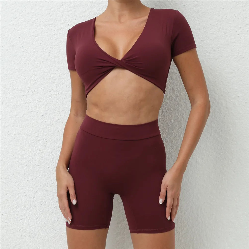 Xooie Fit short sleeve crop top and shorts set in maroon with twist front crop top and high-waisted shorts