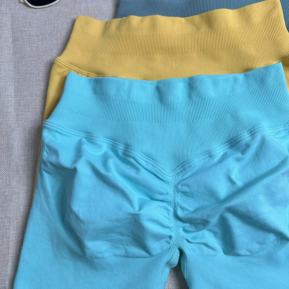 Xooie Fit Two-Piece Set featuring side-strap bra and leggings in vibrant colors for activewear