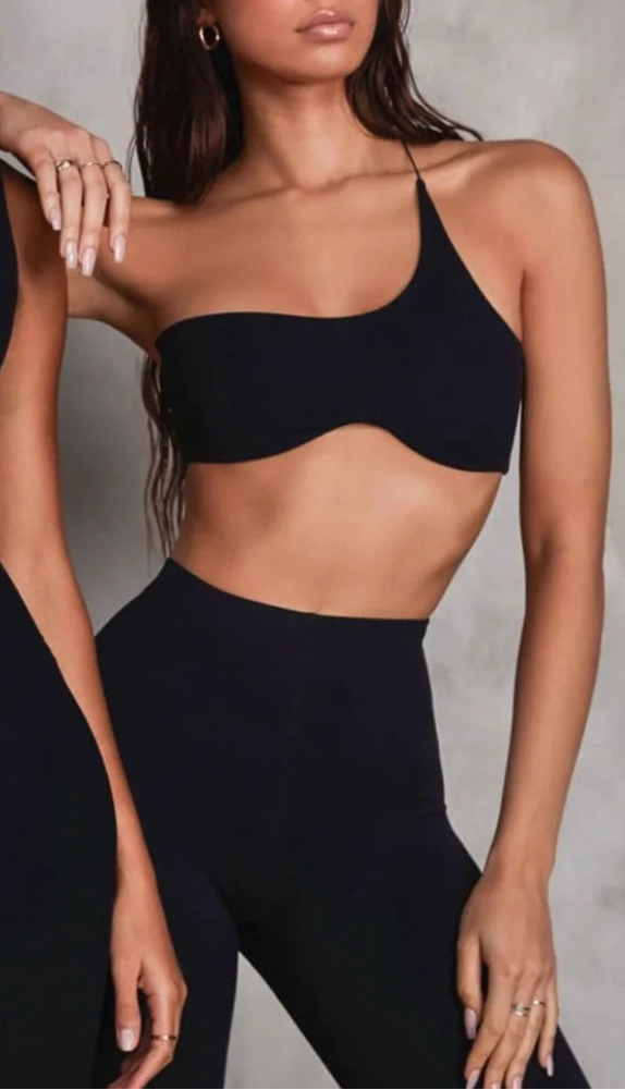 Xooie Fit black single-strap bralette for workouts with a stylish, sleek design