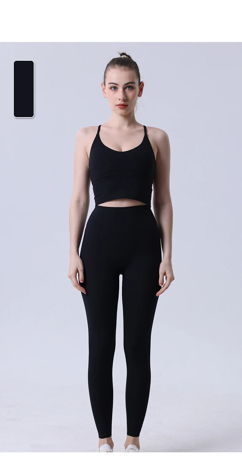 Xooie Fit two-piece set featuring a spaghetti strap activewear top and leggings in black