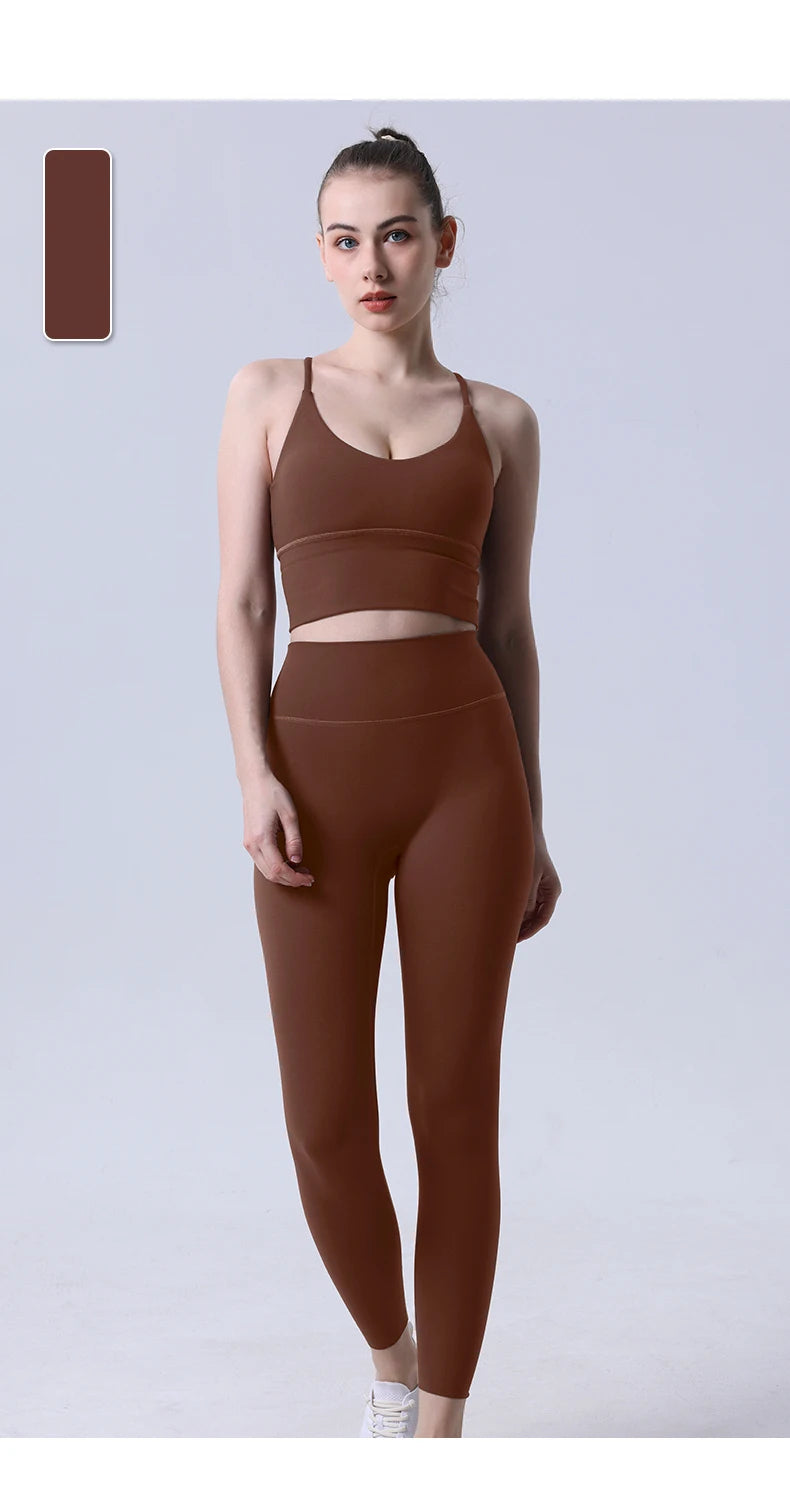 Xooie Fit Two-Piece Set featuring a spaghetti strap activewear top and leggings in brown color