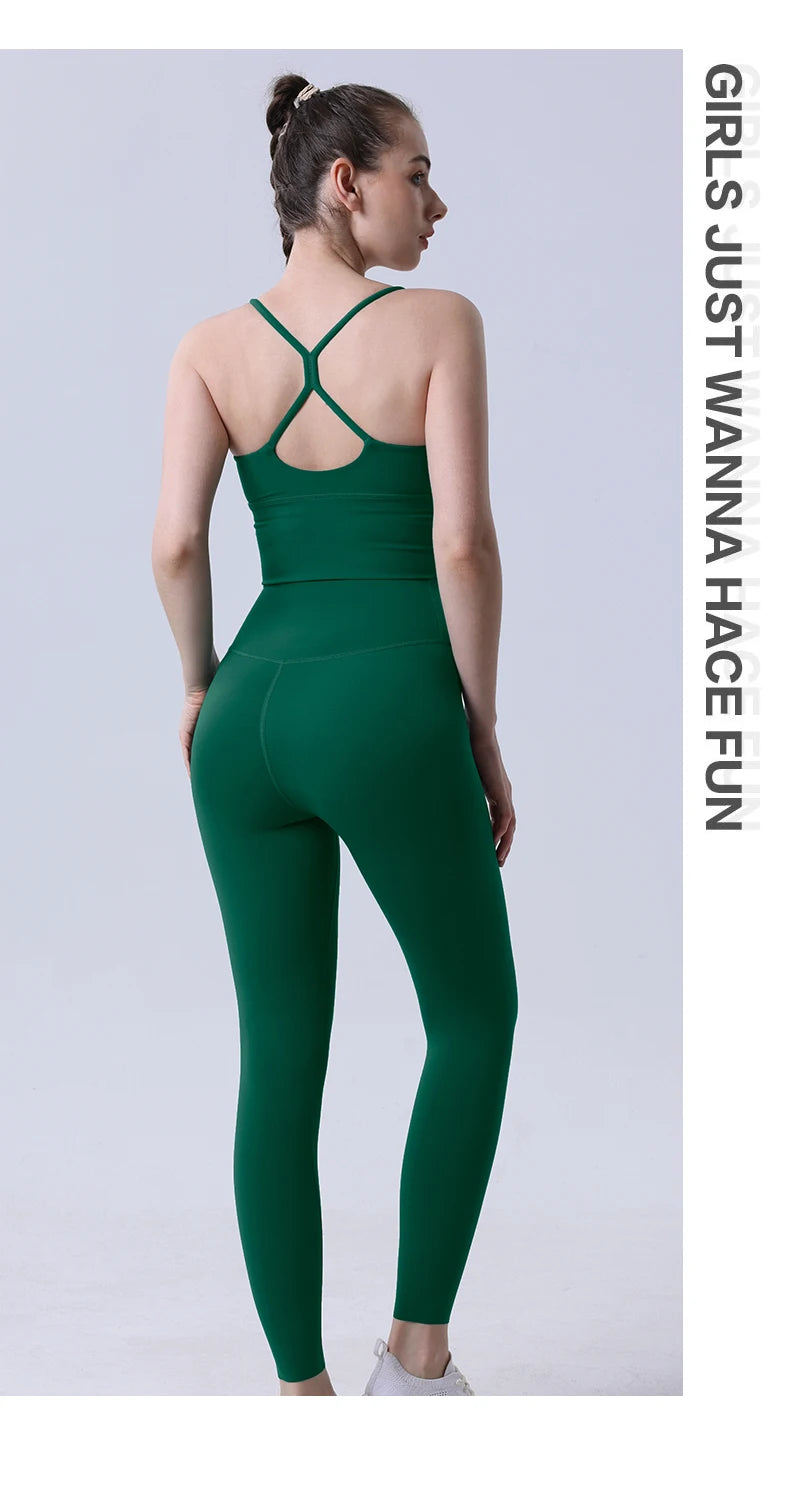 Xooie Fit two-piece set featuring a spaghetti strap activewear top and leggings in green color