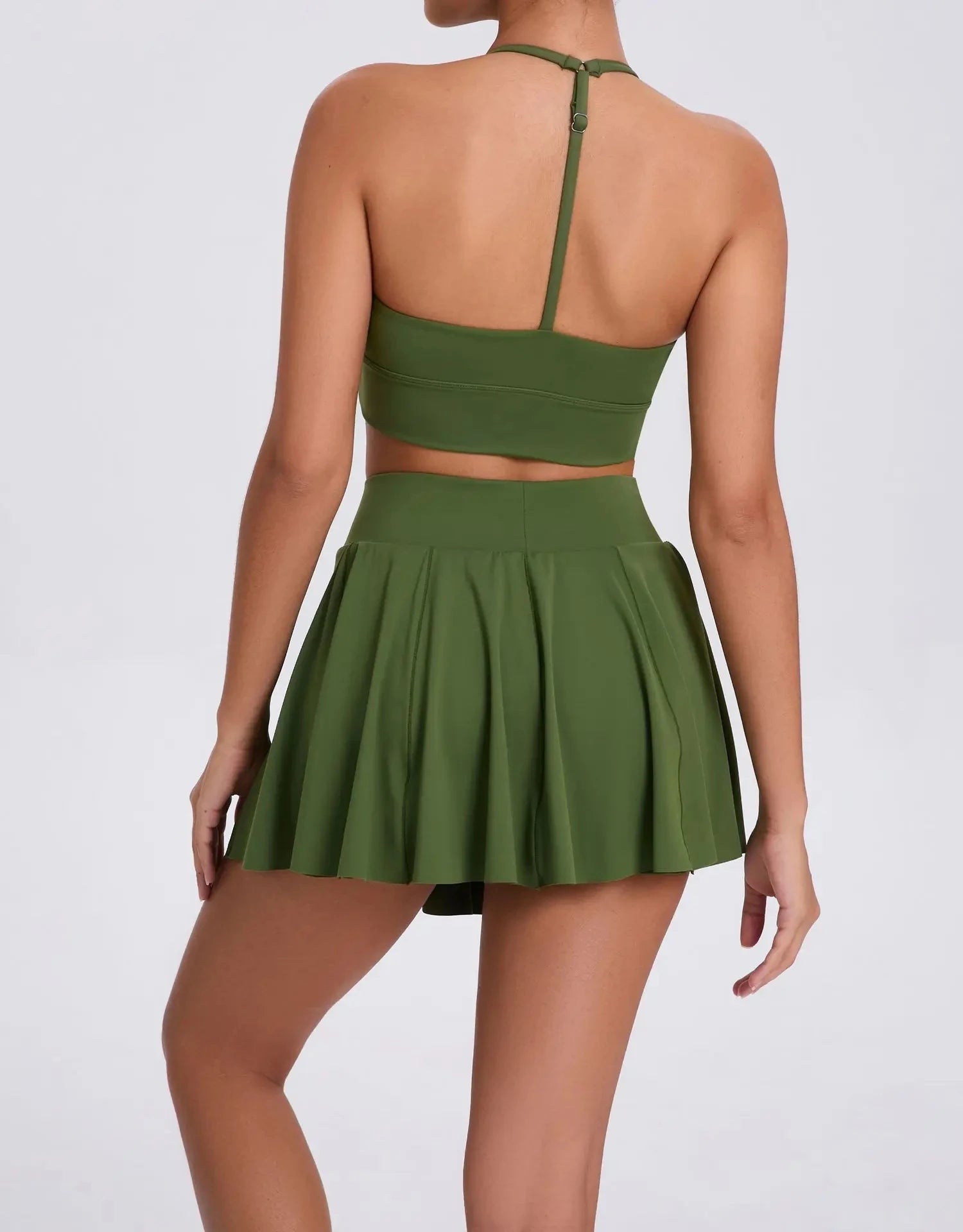 Xooie Fit sport bra and skort with pockets in green for activewear style and comfort