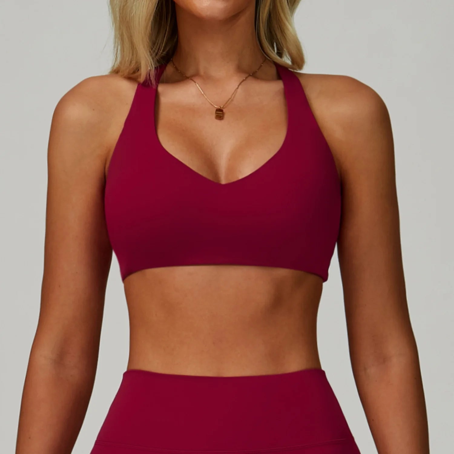 High-intensity sports bra, rose red, V-neck with wide racerback straps