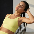 Lift Em' yellow active sports bra with scoop neckline and supportive mid-length hem