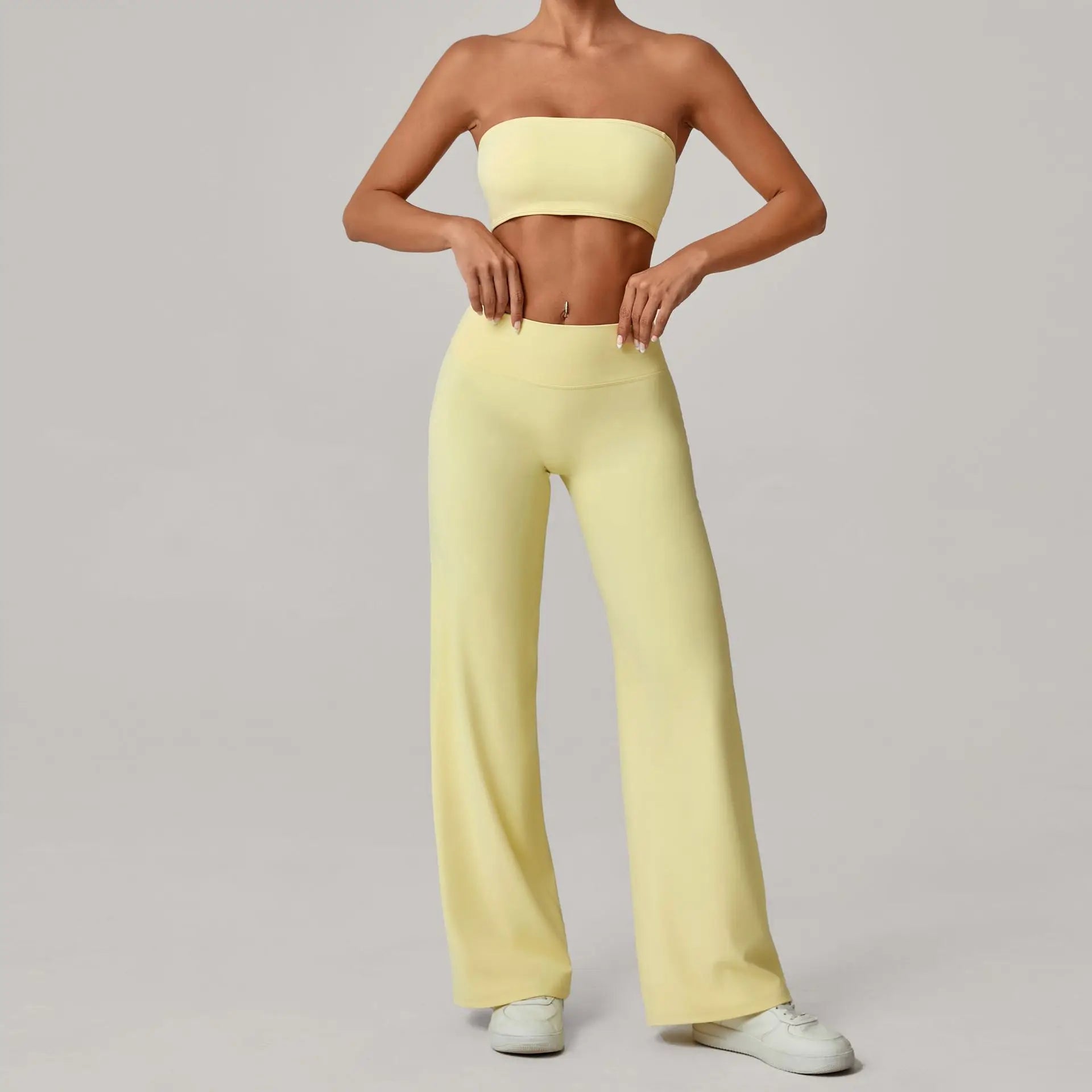 Xooie Fit strapless backless bra and flare pants set in soft yellow for stylish comfort