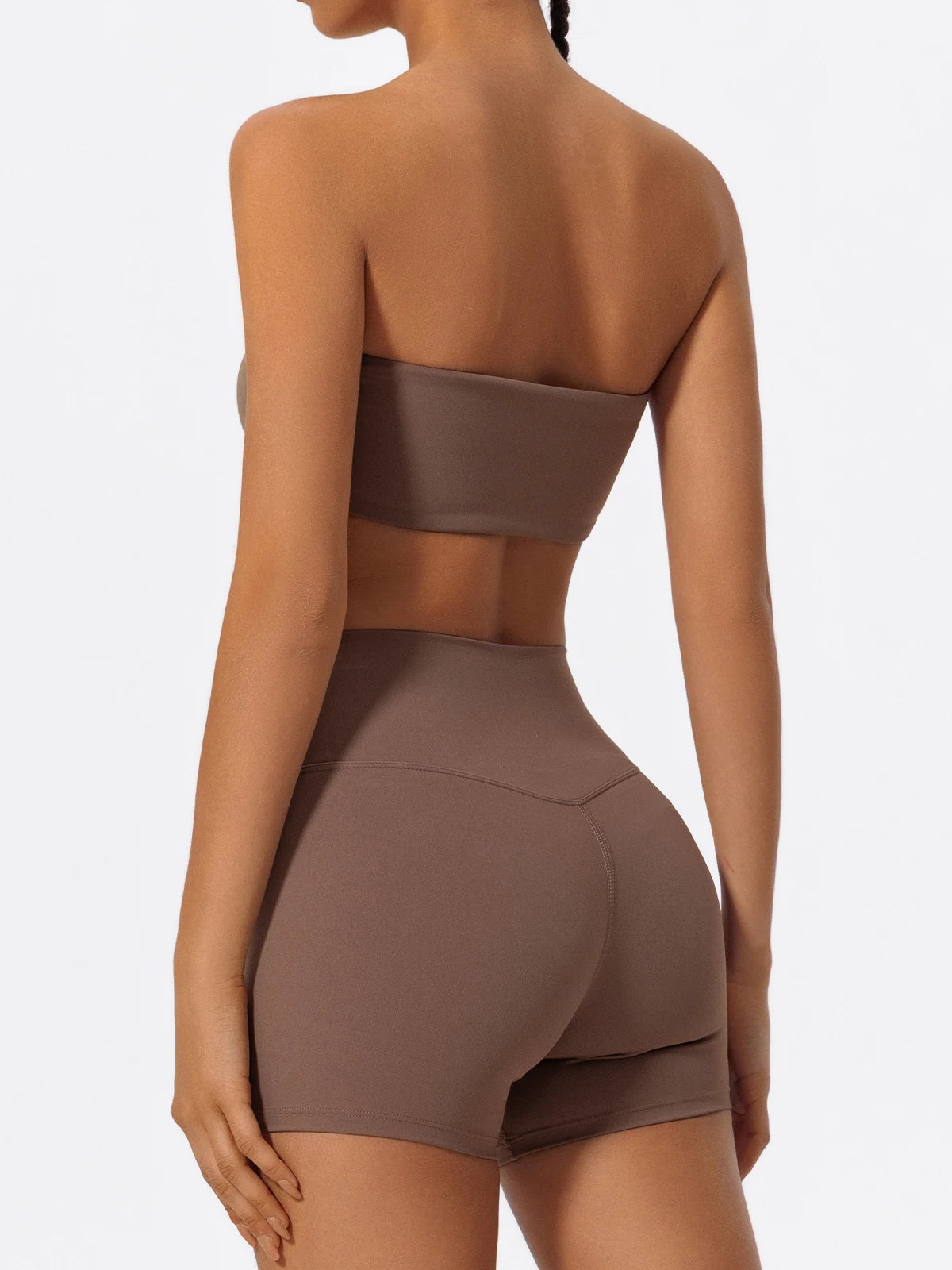Back view: women’s strapless sports bra and high-waist shorts set, brown