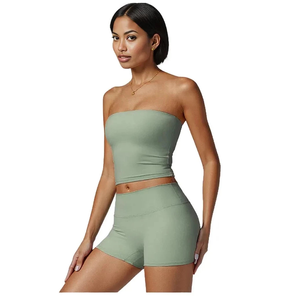 Xooie Fit Strapless workout top in green with a fitted design for comfort during exercise