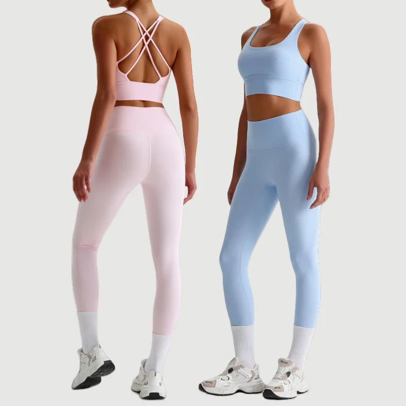 Xooie Fit strappy back fitness bra and leggings set in pink and blue for stylish workouts