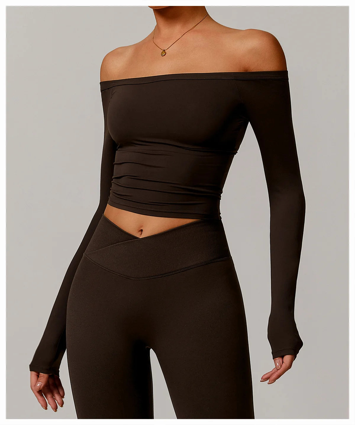 Xooie Fit black off-shoulder stretchy long-sleeve workout shirt worn with matching leggings
