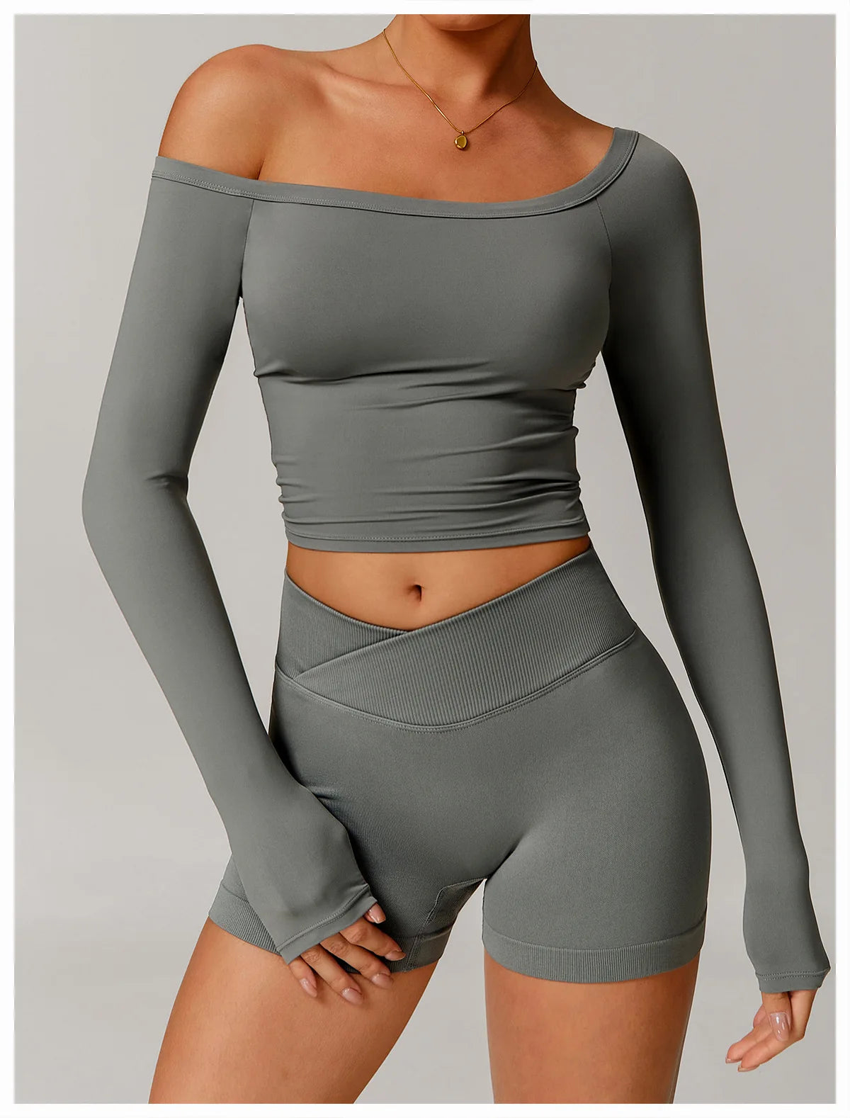 Xooie Fit stretchy long-sleeve workout shirt in gray with off-shoulder design and slim fit