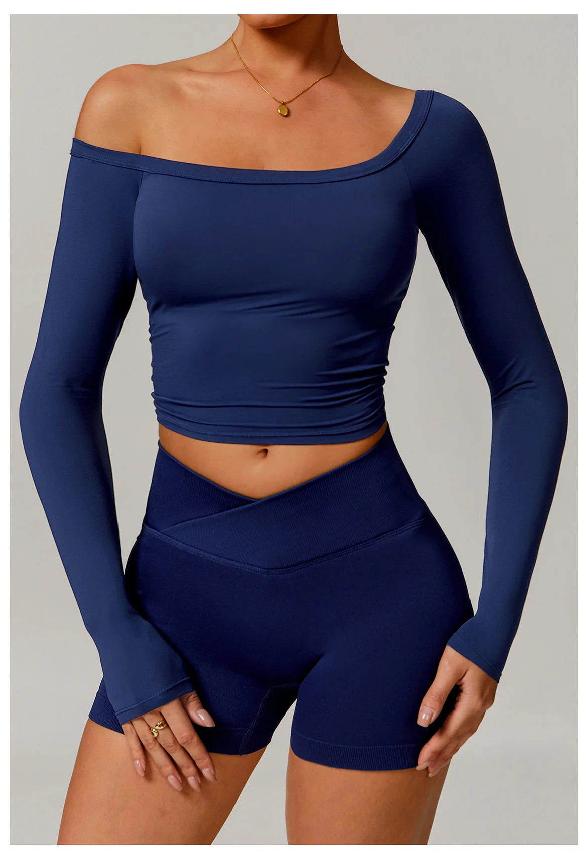 Xooie Fit navy blue stretchy long-sleeve workout shirt with off-shoulder design