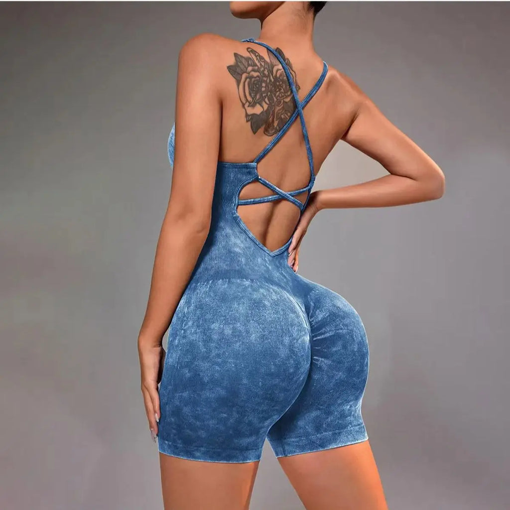 Washed blue strappy yoga unitard romper with crisscross open back straps