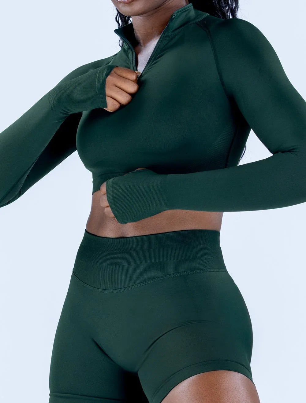Xooie Fit women's zip crop top long sleeve in dark green, ideal for active wear and workouts
