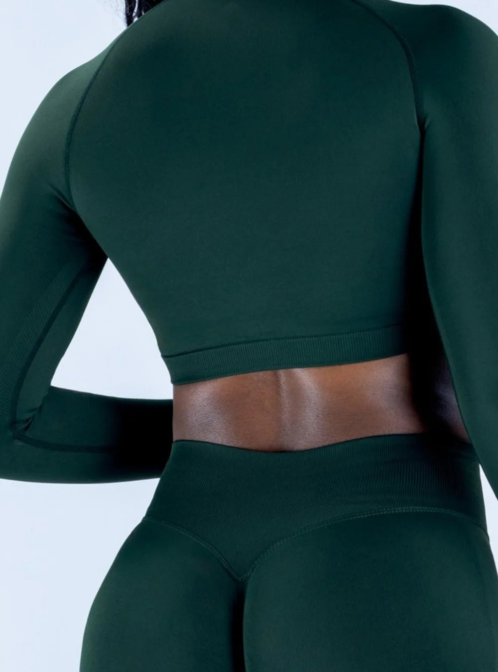 Xooie Fit women's zip crop top long sleeve in green with a fitted design for active wear