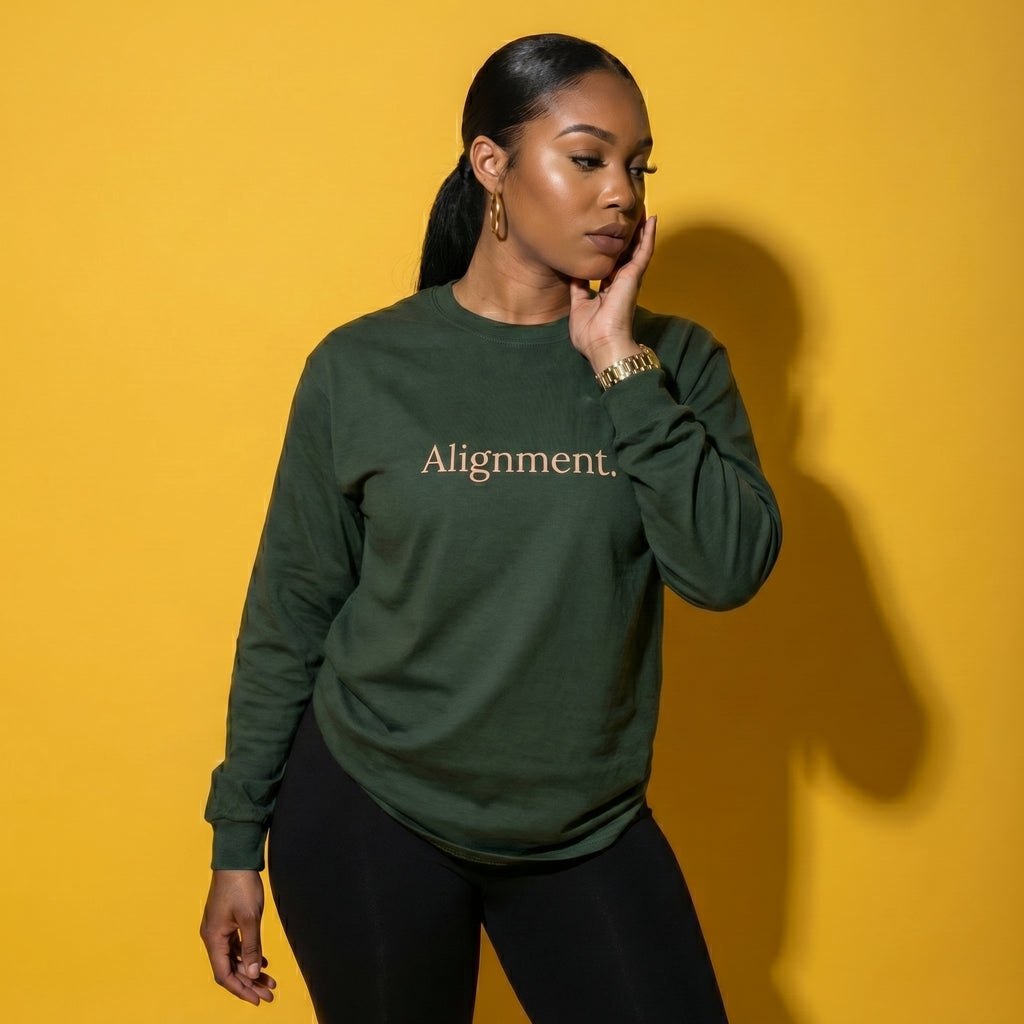 Jungle green long-sleeve unisex tee with “Alignment” graphic on the front