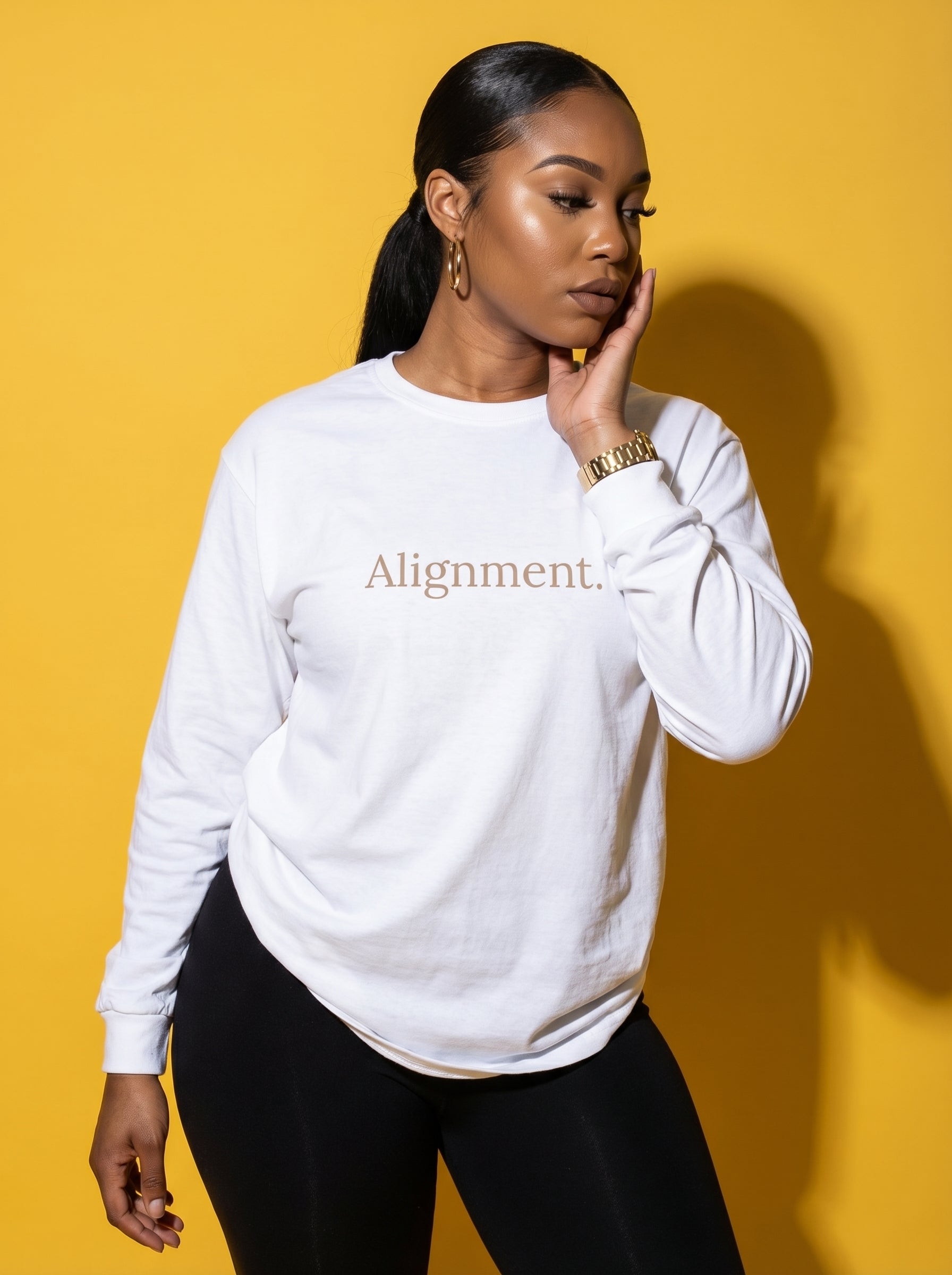 White long-sleeve unisex graphic tee with “Alignment” on the chest