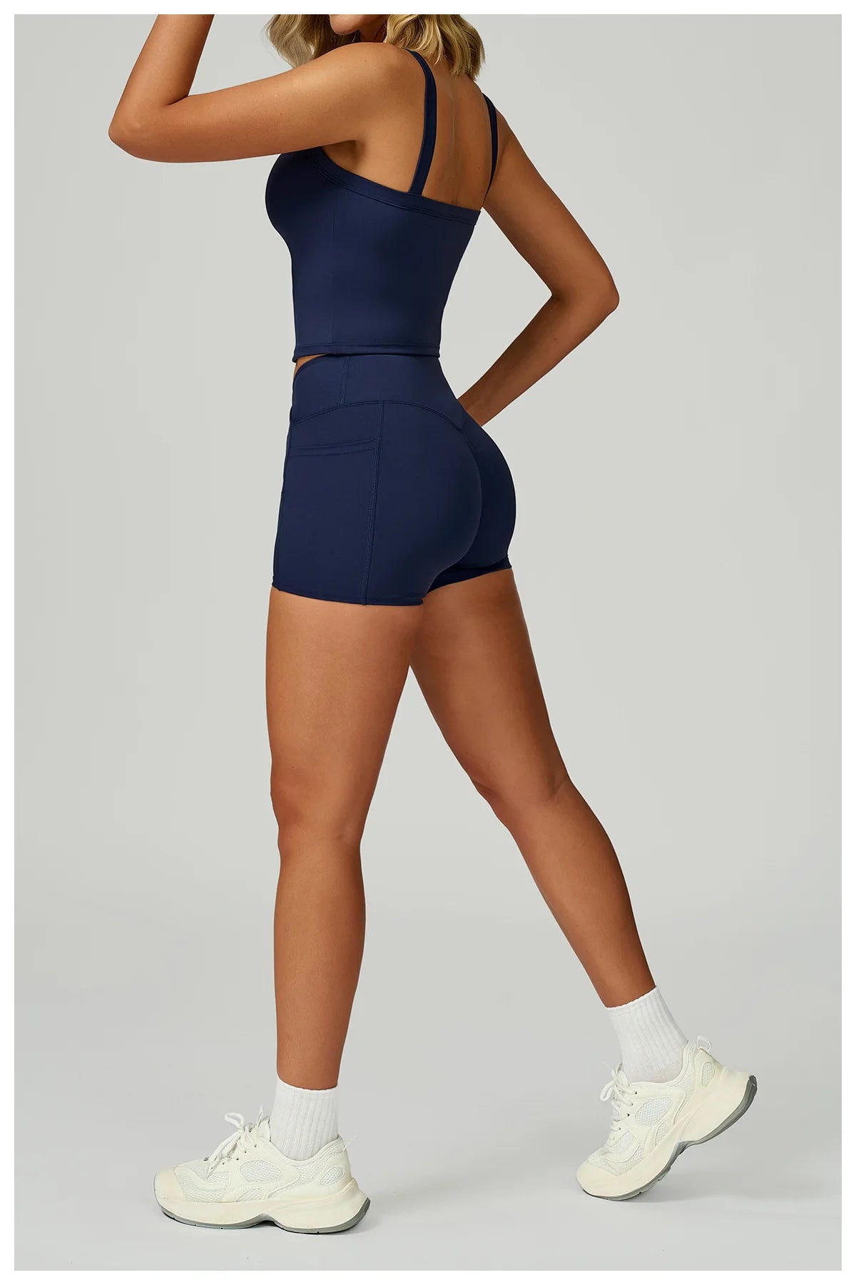Navy tank and shorts set, racerback style with fitted high-waist shorts