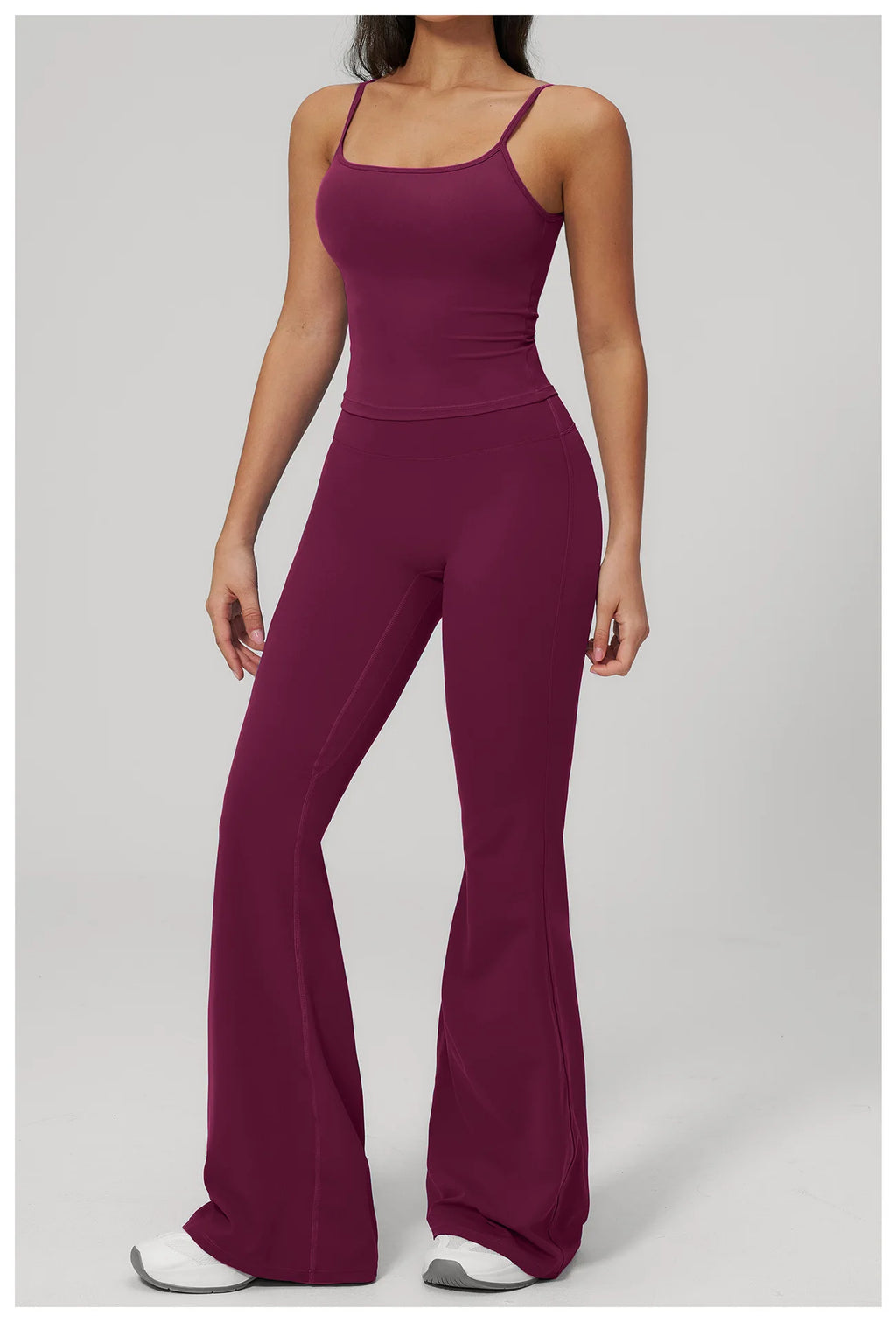 Women's purple sports set, front view: spaghetti-strap tank and flared leggings