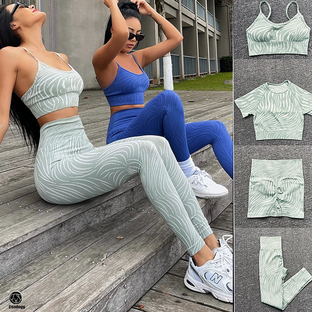Xooie Fit tiger striped workout set featuring a matching crop top and leggings in a stylish design