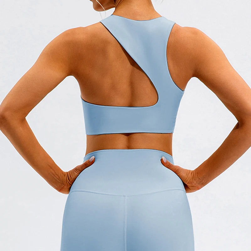 Xooie Fit light blue unique open-back bralette showing sporty design and comfort