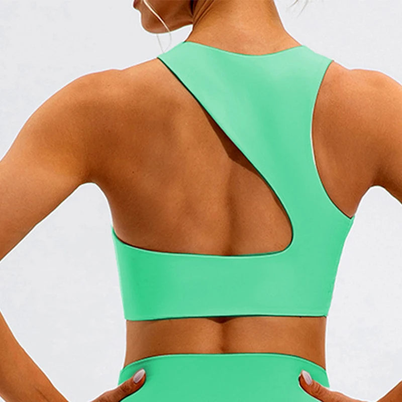 Xooie Fit unique open-back bralette in green with asymmetrical racerback design for stylish support