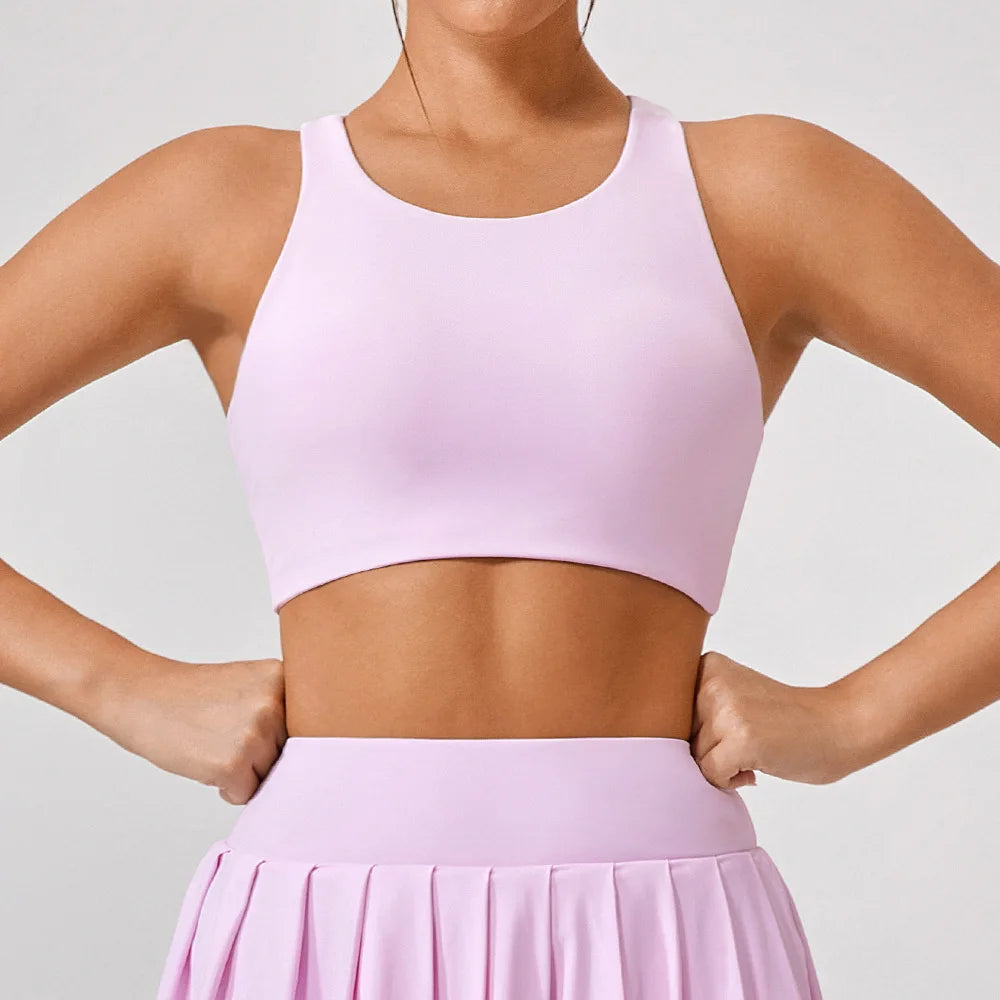 Xooie Fit light pink unique open-back bralette with wide straps and smooth fabric