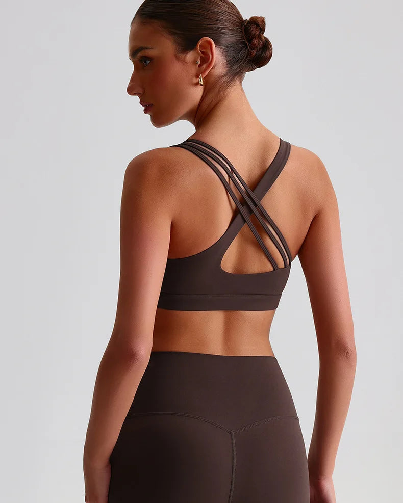 Unique strappy sports bra for women in brown with stylish back design and optimal support