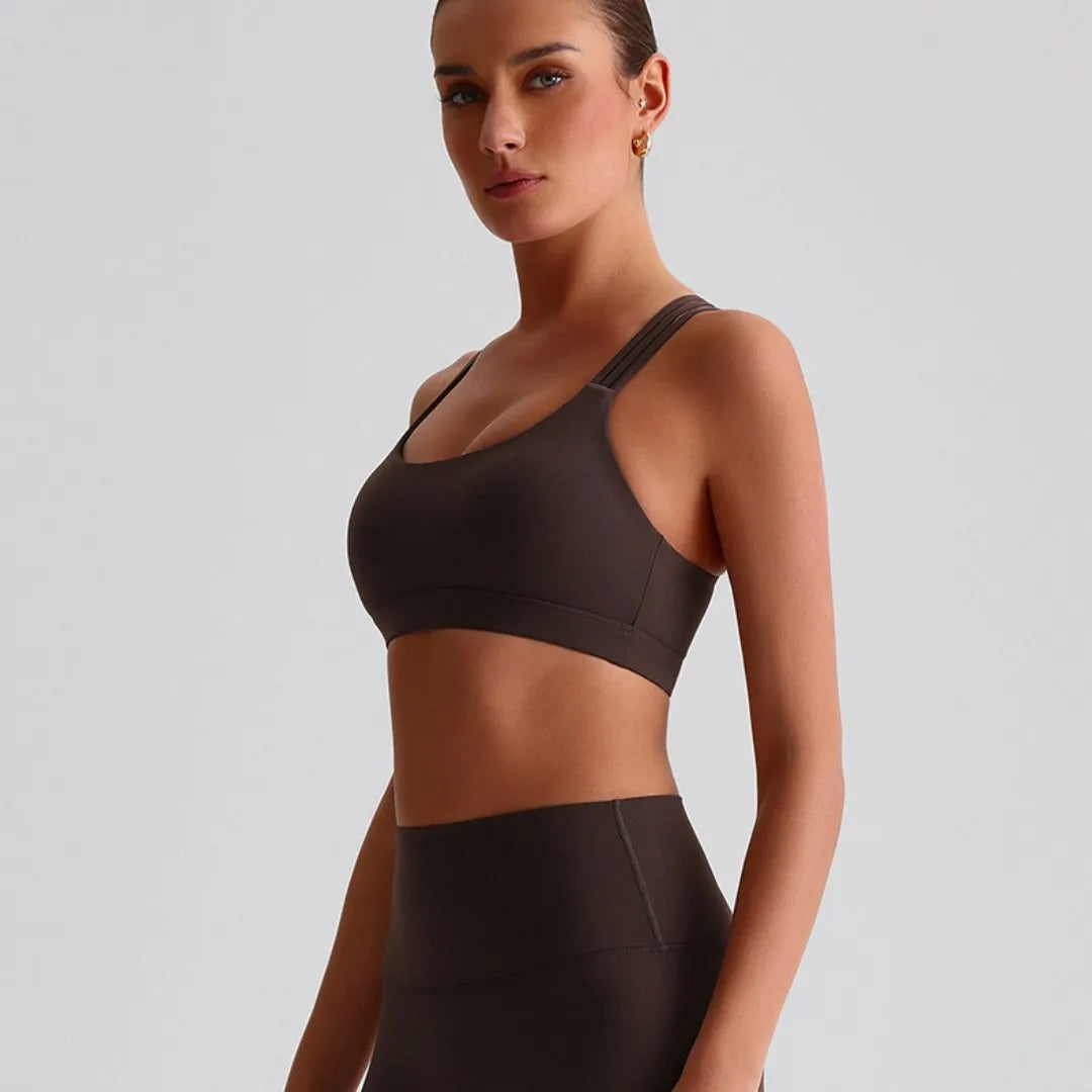 Unique strappy sports bra for women in brown, designed for comfort and support during workouts