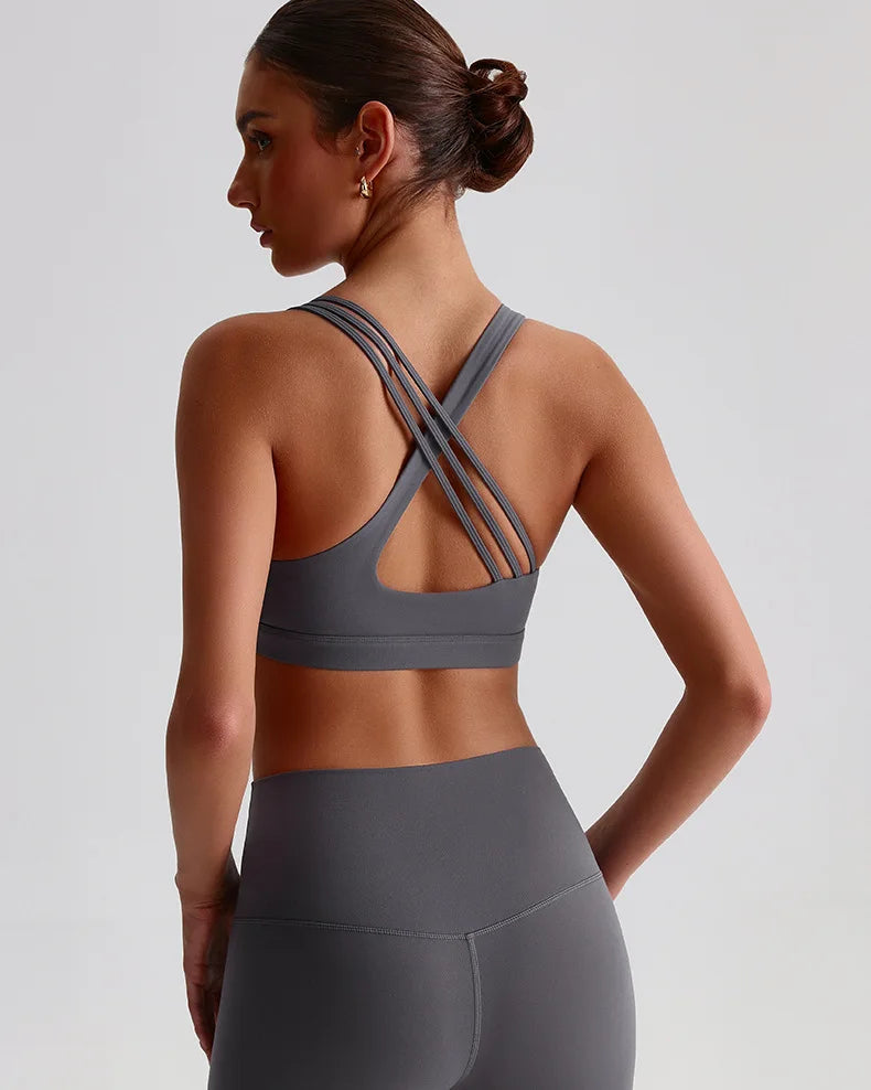 Back view of Xooie Fit unique strappy sports bra for women designed for comfort and support during workouts