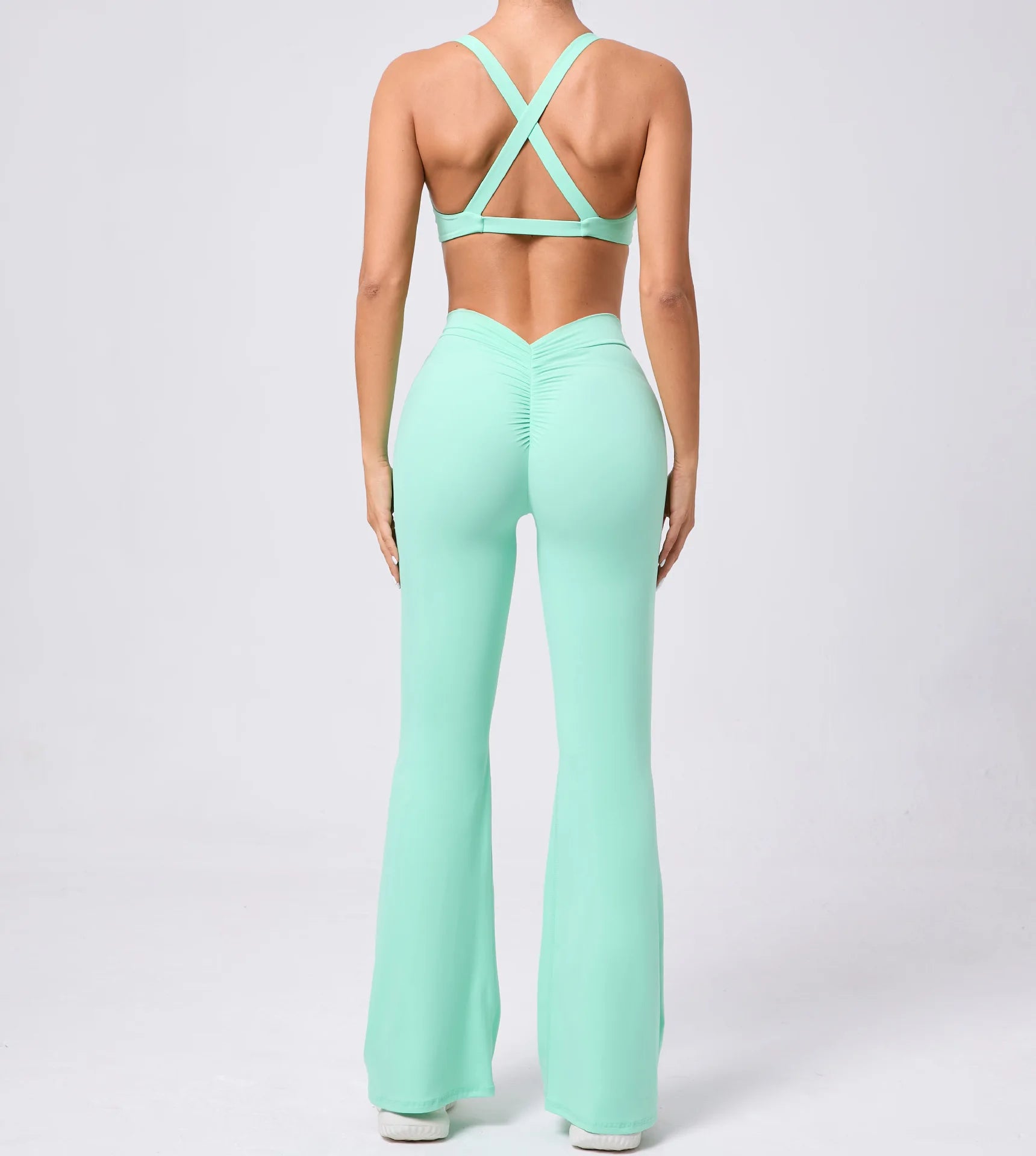 Xooie Fit V-shaped flare fitness leggings in mint green showcasing a stylish back view