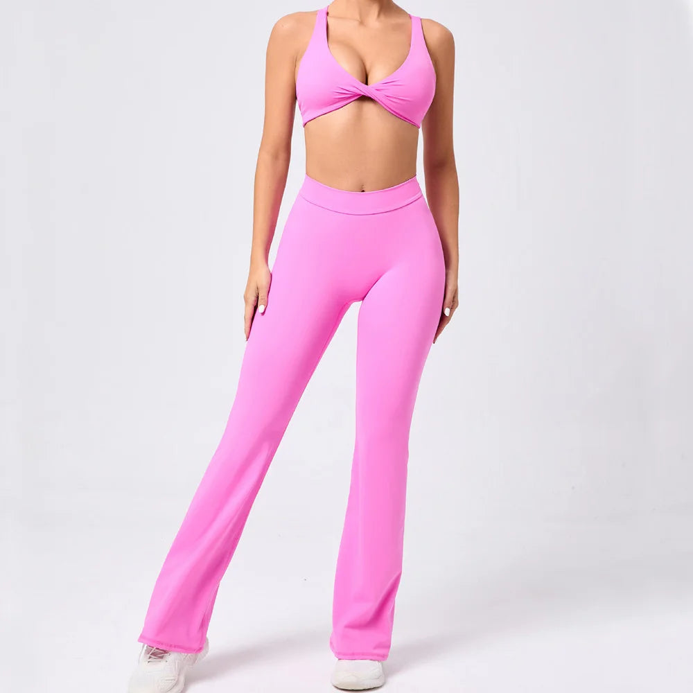 V-shaped flare fitness leggings by Xooie Fit in bright pink for stylish workout wear