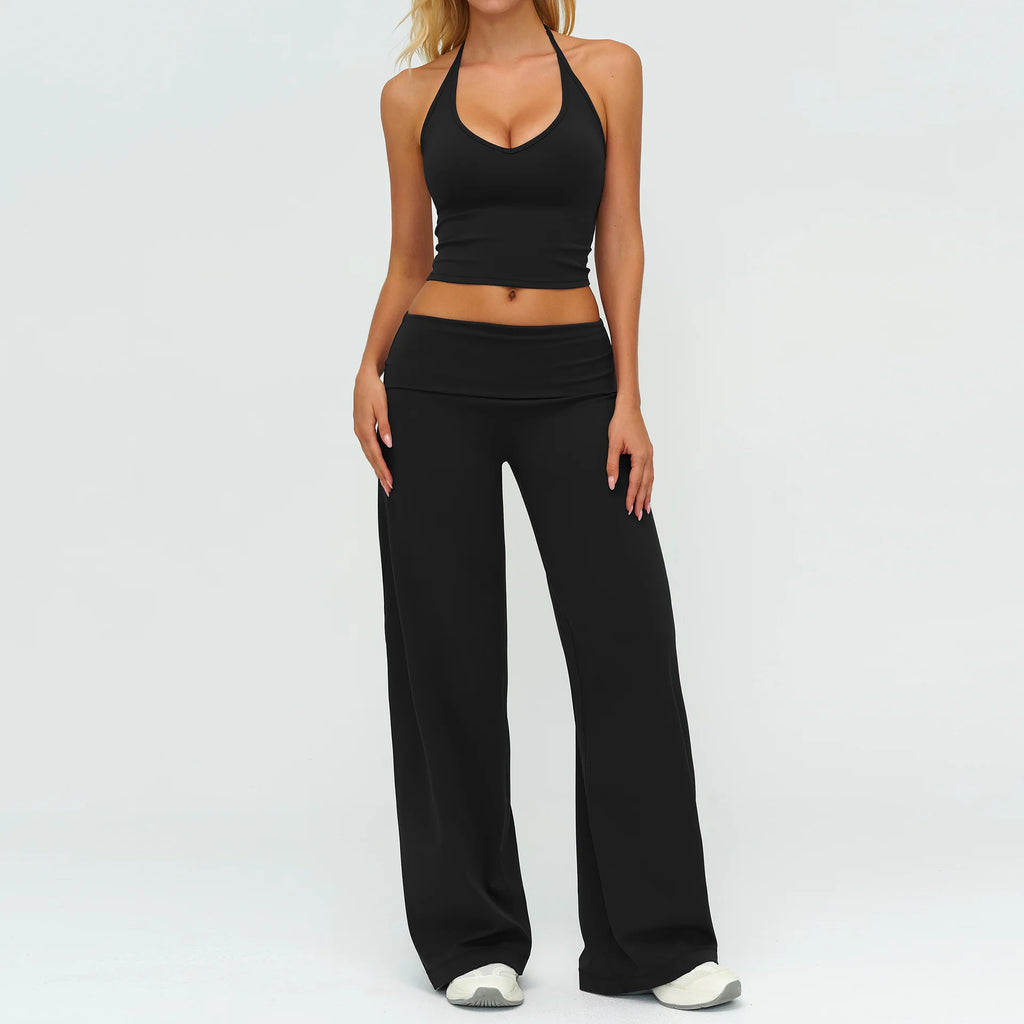 Black halter strap tank top with matching wide-leg flare pants, active set