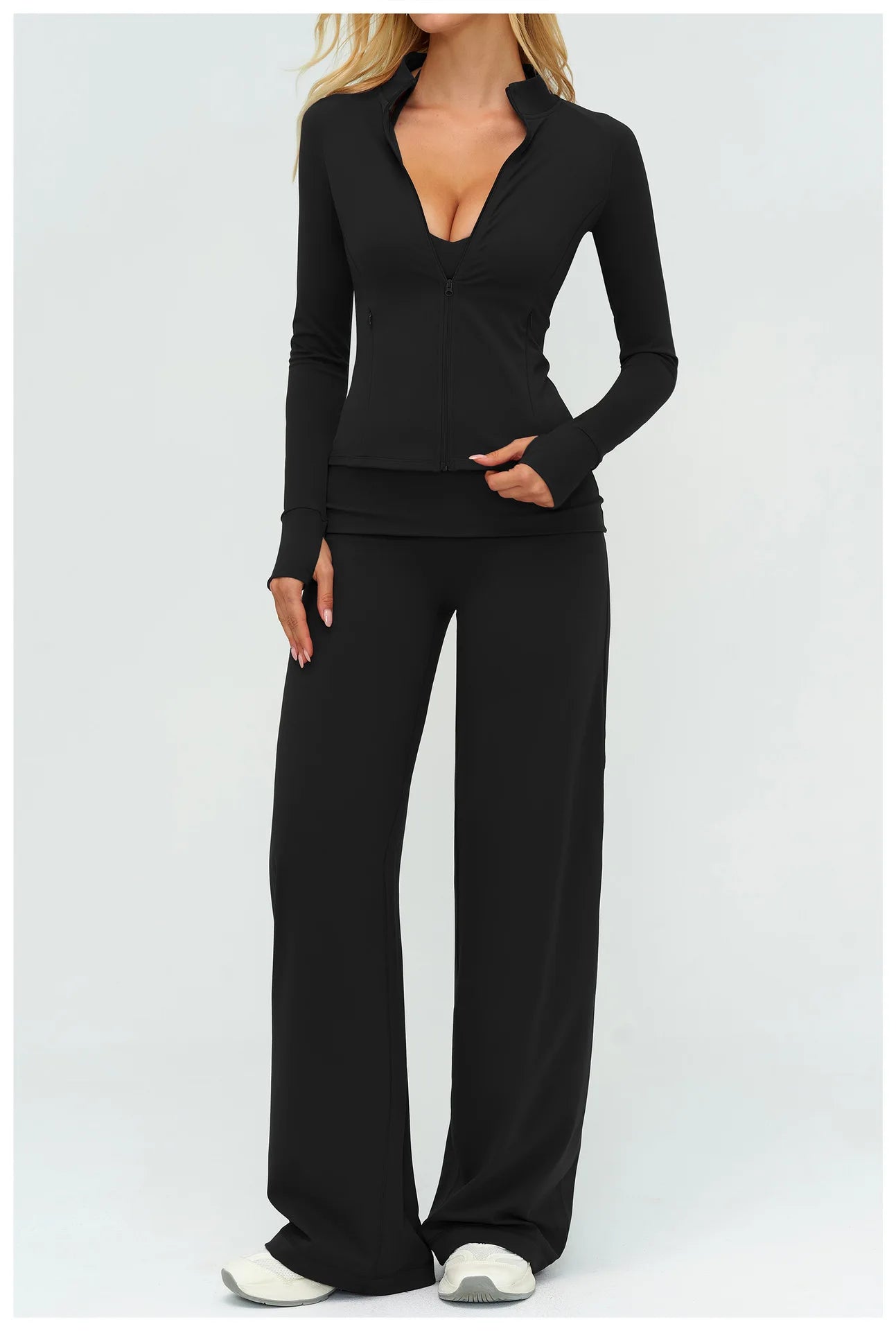 Black matching active set: zip-front jacket and wide-leg flare pants