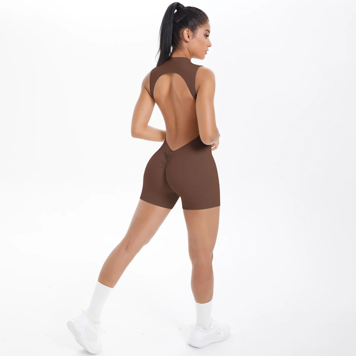 Xooie Fit backless active romper for women in brown with a stylish open back design